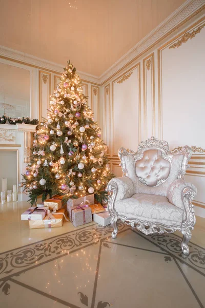Calm image of interior Classic New Year Tree decorated in a room with fireplace — Stock Photo, Image