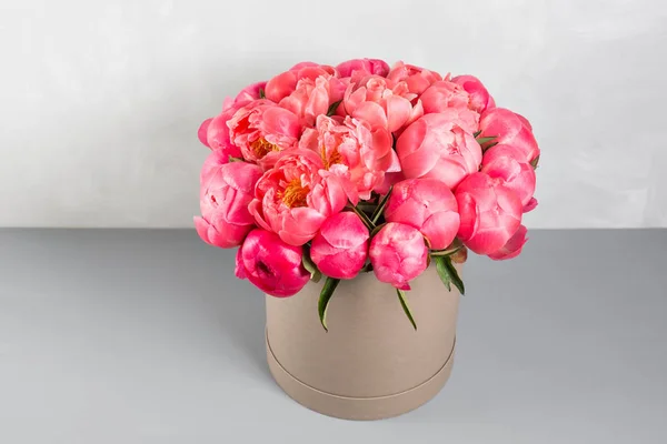 peonies grade Coral Sharm. beautiful mix coral and pink flower bouquet in round box with lid