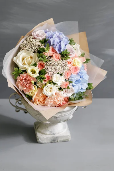 Beautiful bouquet made of different flowers on grey background. colorful color mix flower. — Stock Photo, Image