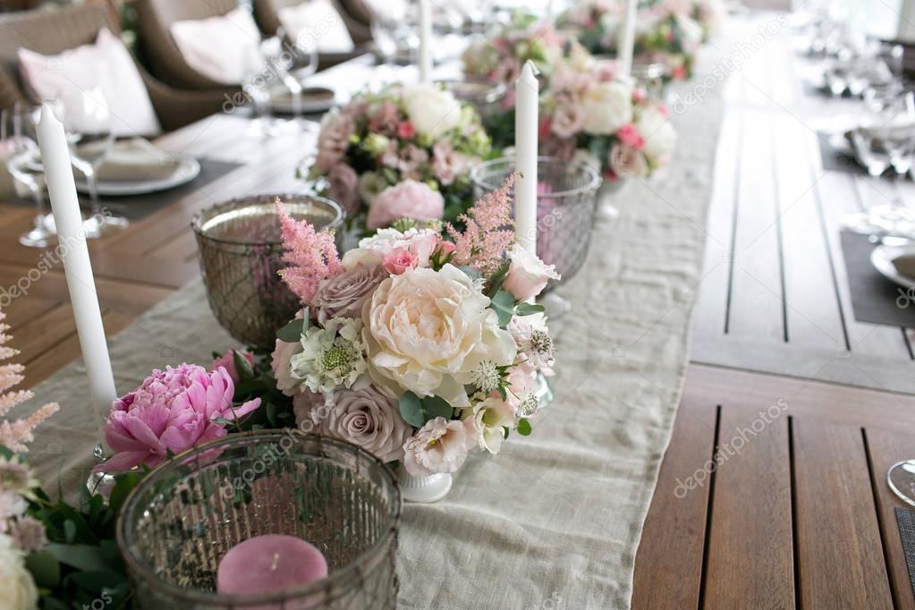 Luxury, elegant wedding reception table arrangement, floral centerpiece