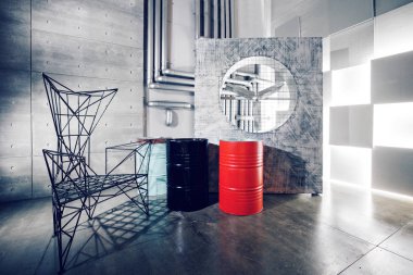 Beton duvar iç dekor, sert metal sandalye ve varil