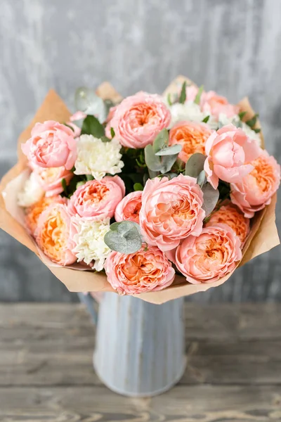 Beautiful luxury bouquet of mixed flowers in vase . the work of the florist at a flower shop. copy space — Stock Photo, Image