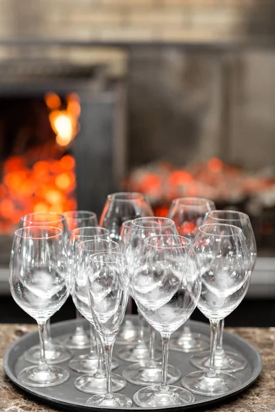 Empty glasses wine in restaurant. Glass water. A tray of wine glasses at a wedding reception