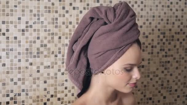 Attractive woman relaxing in a hammam - turkish steam bath with ceramic tile in roman style — Stock Video