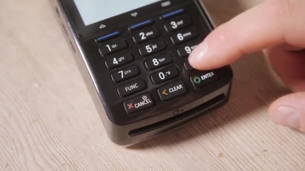 Close-up. Moment of payment with a credit card through terminal. Buy and sell. Products service — Stock Video