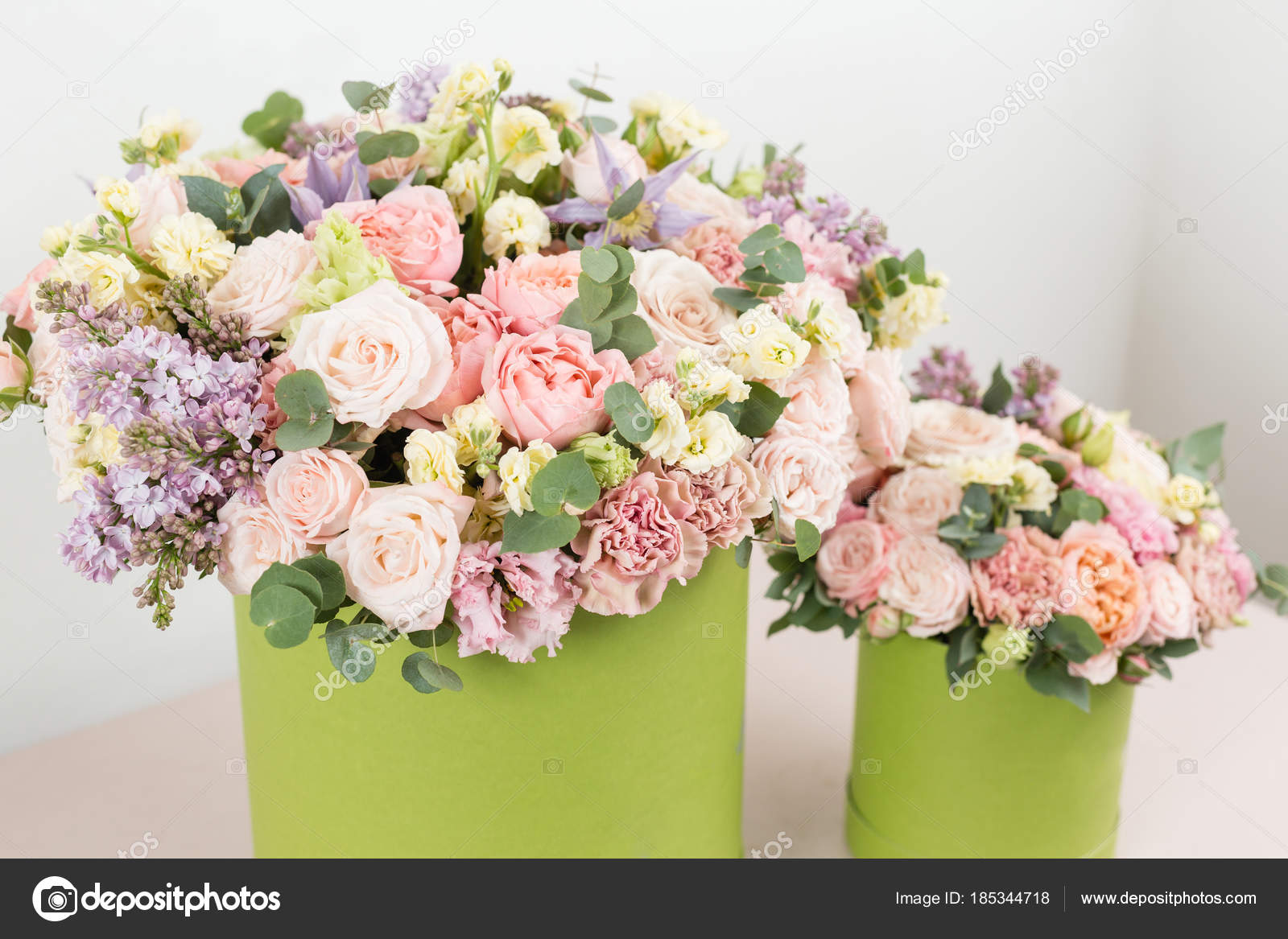 Beautiful luxury bunch of mixed flowers on pink table. the work of the