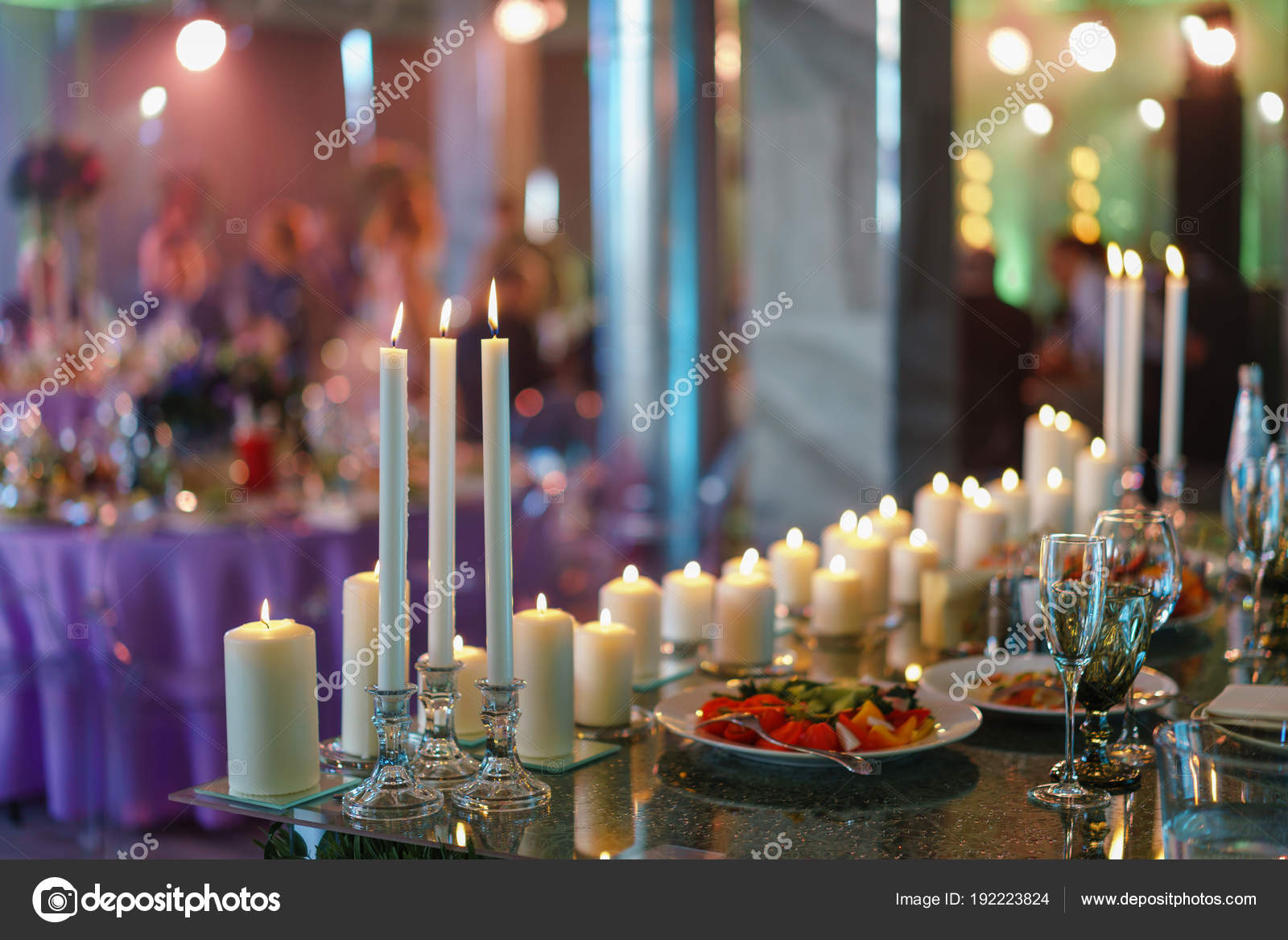 Burning Candle White Candles On Glass Candlesticks Stand On