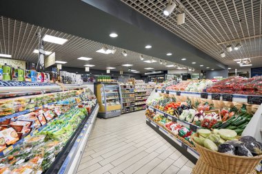 Milan, Italy - January 21 2019: Milan Central Station. Sapori and Dintorni Conad supermarket. Fruit and vegetable department with numerous varieties of fruit exposed inside supermarket.