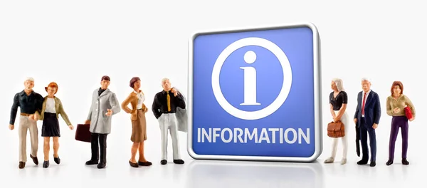miniature people - A group of people standing in front a information board.
