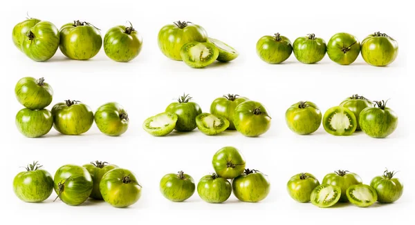 白い背景の上の緑のトマトとの複合体 — ストック写真