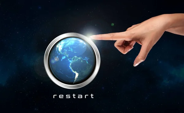 Woman Finger Front Button Restart Planet Earth — стоковое фото