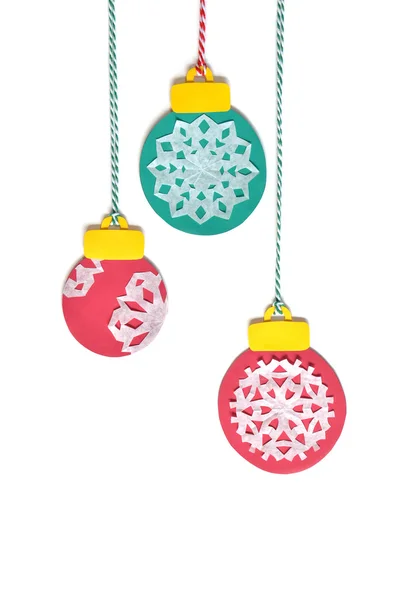 Christmas ball ornaments paper cut on white background - isolated — Stock fotografie