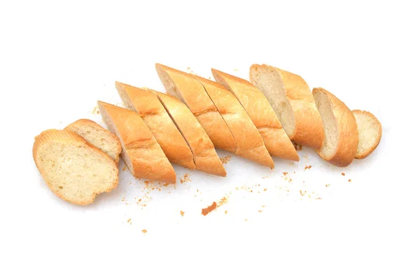 Pane francese affettato su fondo bianco isolato — Foto Stock