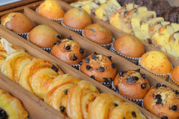 Assorted pastries in wooden box
