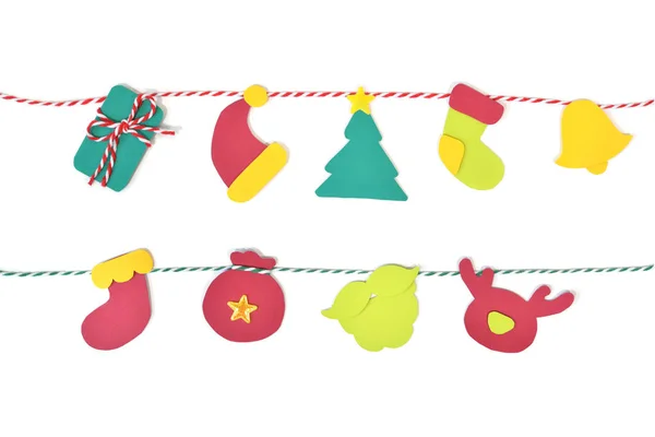 Carta da zucchero natalizia tagliata su sfondo bianco isolato — Foto Stock