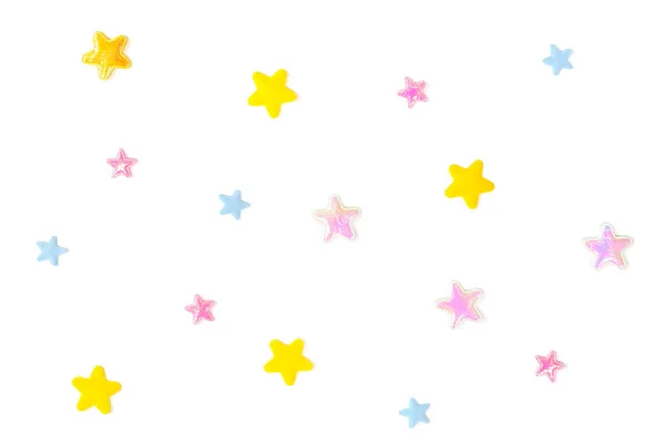 Пастельная звездная бумага вырезанная на белом фоне - изолированная — стоковое фото