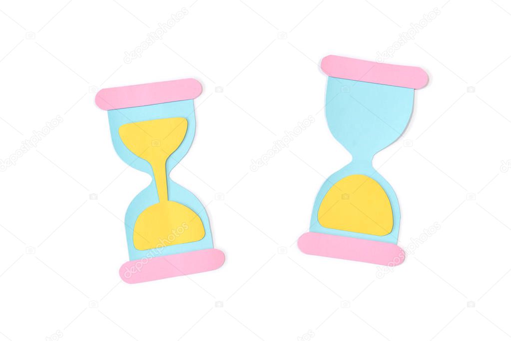 Hourglass paper cut on white background - isolated