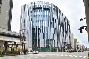 Toyama, Japan - November 3, 2019: Toyama glass art museum  is seen from the other side of the street in Toyama, Japan