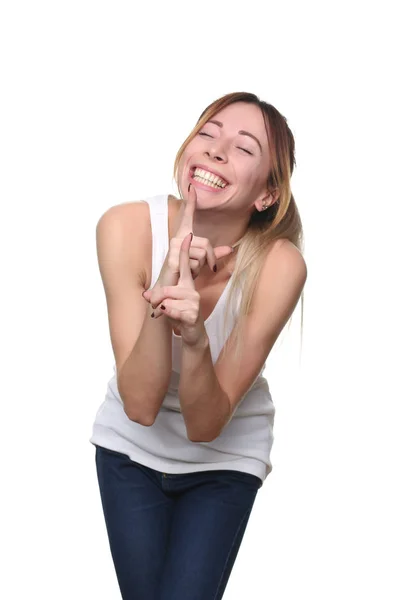 Lány jelentő és mutatja a két ujját. Közelről. Fehér háttér — Stock Fotó