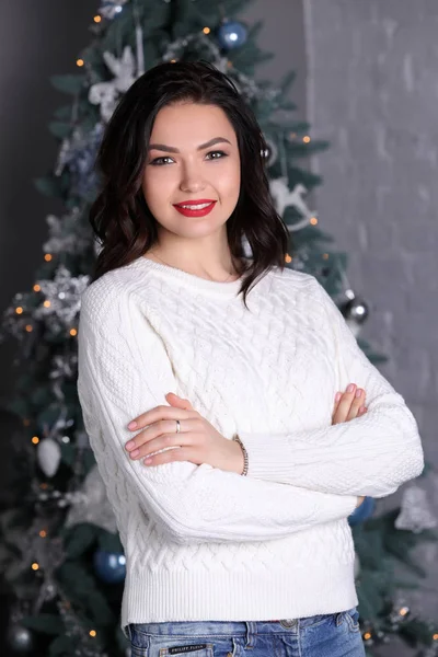 Woman with crossed arms on New Years. Photographie retouchee — Stock Photo, Image