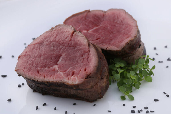 Delicious steak, fresh vegetables, spices for food, grilled meat, food and drink, appetizing food, white plate