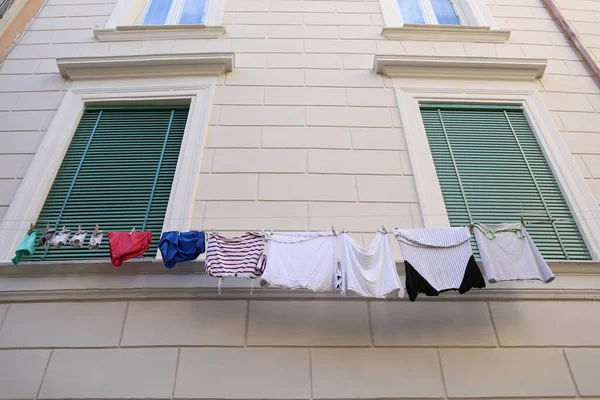 Rome, Italy - 2020. Closed window and drying clothes. — Stock Photo, Image