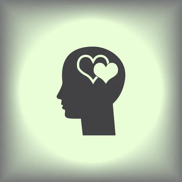 SILhouette de cabeza con símbolo del corazón — Vector de stock