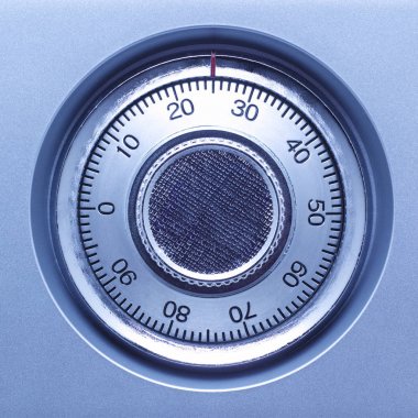 Mavi tonları bir kasaya bir güvenli kilit closeup. 