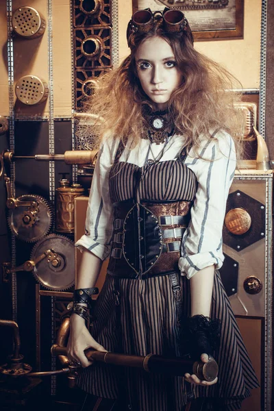 Portrait of a beautiful steampunk woman, with a telescope on a g — Stock Photo, Image