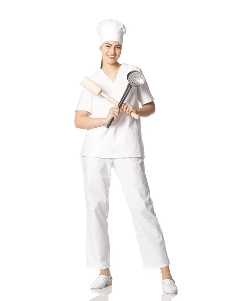Portrait of a young female student in a chef's clothes with cros — Stock Photo, Image