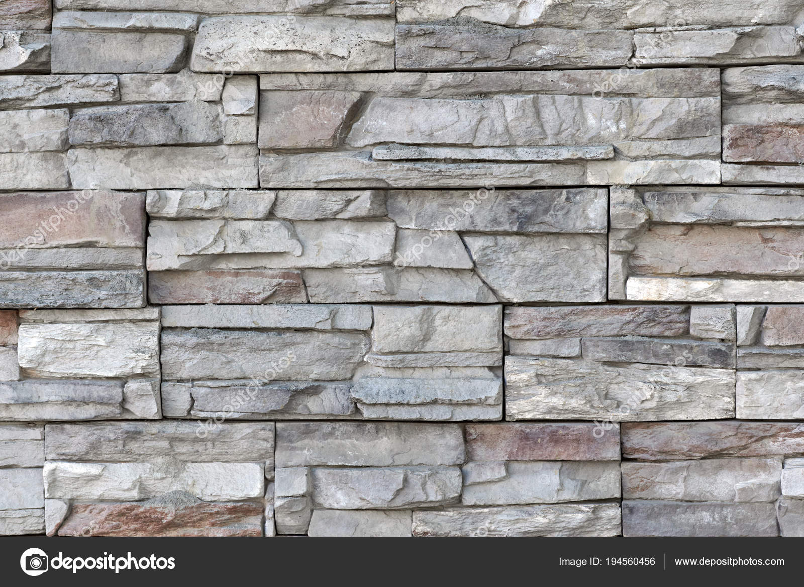 Seamless texture, background, stone lined with granite walls. Sa Stock