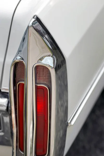 Closeup of a rear chrome lantern in the back of an antique vinta — Stock Photo, Image