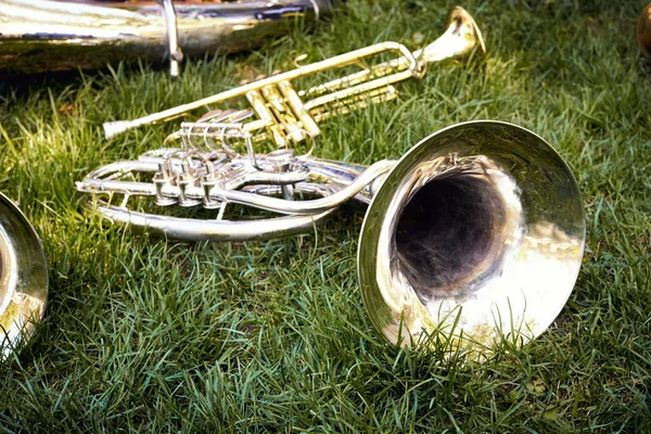 Several musical wind instruments of a trumpet orchestra.