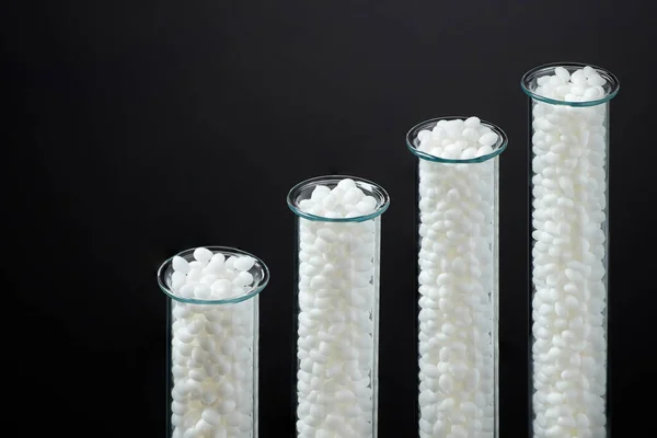 Closeup Granule White Plastic Polymer Laboratory Tubes Dark Background 이미지 — 스톡 사진