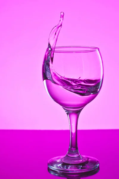 a glass of water on white background.