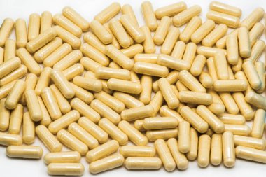 Hafif arka planda vejetaryen kapsülleri