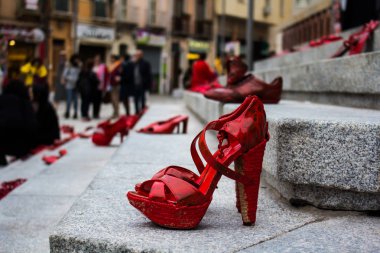CAGLIARI, ITALY - NOVEMBER 25, 2017: Zapatos rojos by Elina Chauvet near Piazza Garibaldi - Sardinia clipart