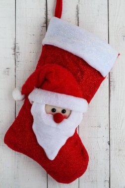 Kırmızı Noel Noel Baba'nın Tekstil kafasına beyaz bir arka plan ile çizme.