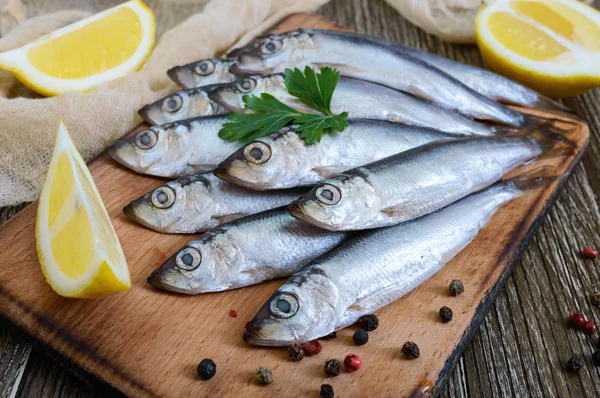 Small Salted Hamsa Sprat Spices Lemon Wooden Background — Stock Photo, Image