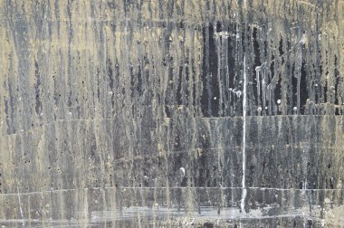 Çatlak ve boya lekeleri olan eski bir beton arka plan. Fotoğraf arkaplanı.