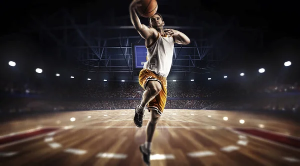 One basketball player jump in stadium panorama view — Stock Photo, Image