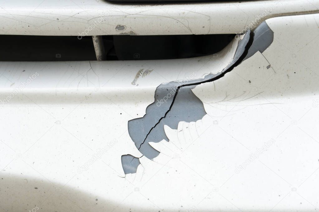 Cracks on cars due to impact or bump.