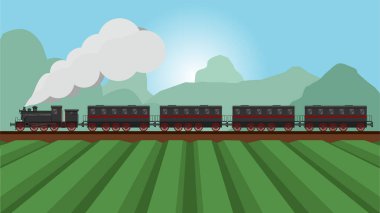 Siyah tonları ve kırmızı çelik tekerlekleri olan WebSteam lokomotifi. Ön planda tarım arazisi ve arka planda dağlık bir çevresi olan kırsal bölgelerde seyahat etmek.
