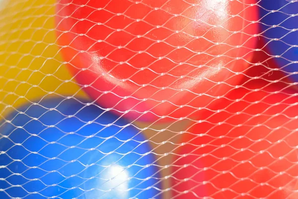Macro achtergrond textuur van kleurrijke plastic ballen — Stockfoto