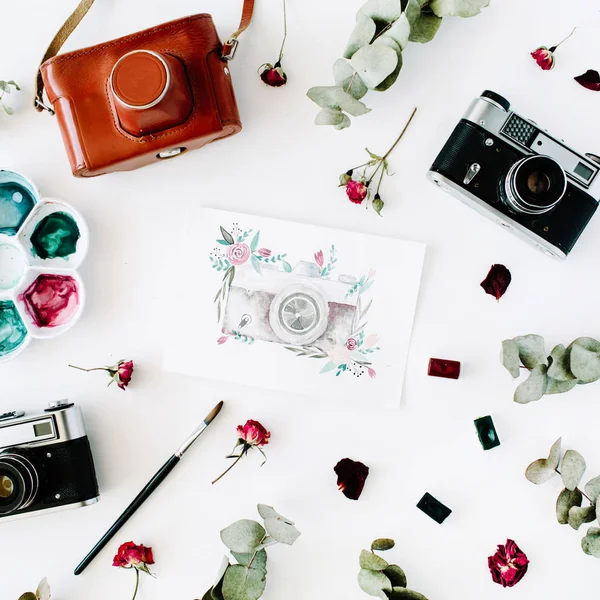 Espaço de trabalho com câmera de foto retro vintage — Fotografia de Stock