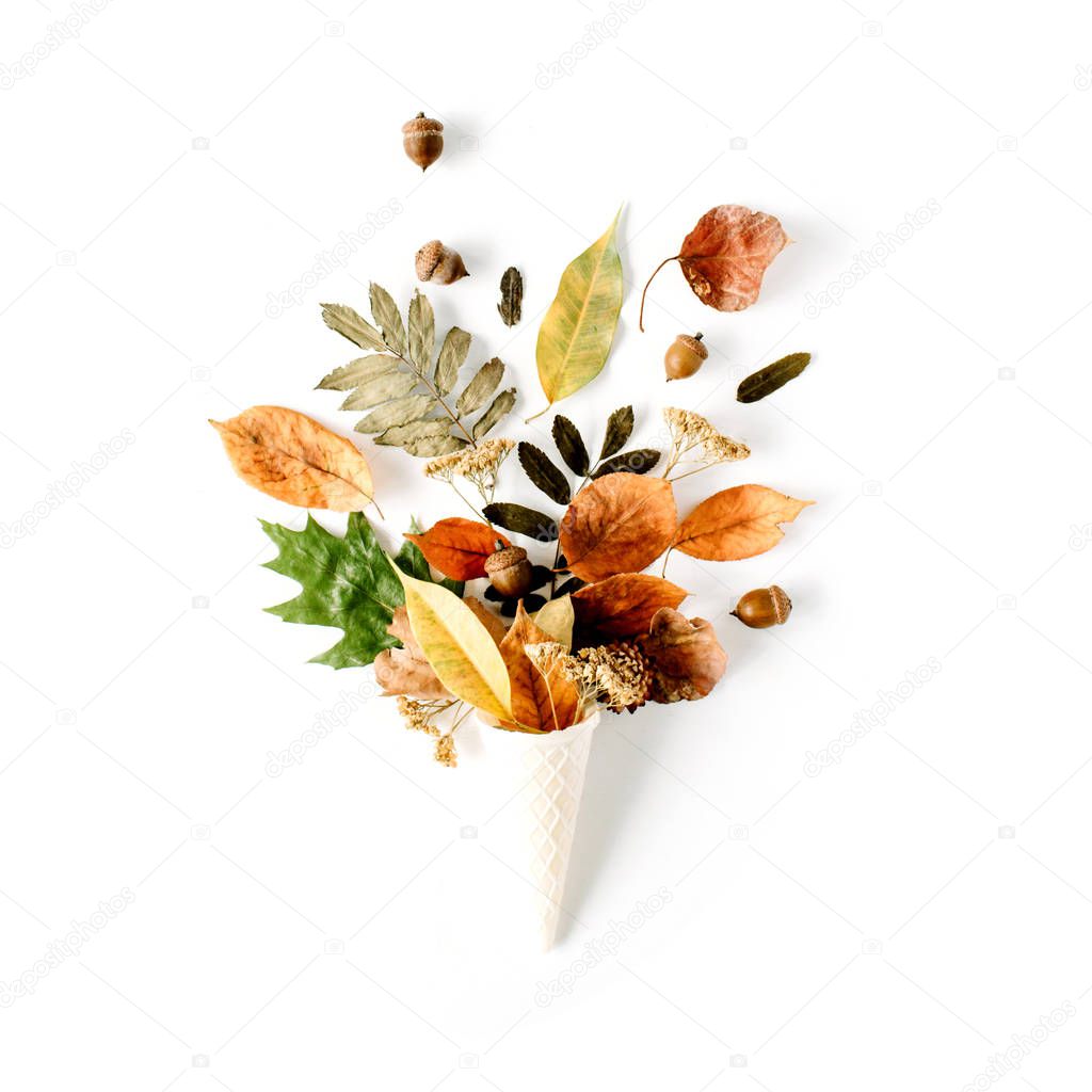 Waffle cone with dried autumn leaves