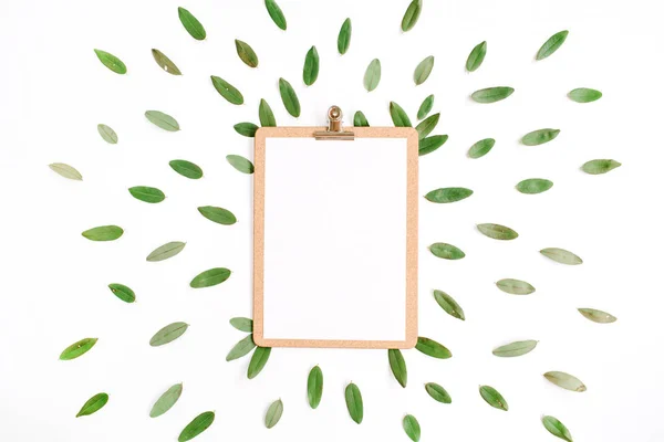 Clipboard with green petals — Stock Photo, Image