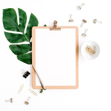 Mockup with clipboard, palm leaf and clips