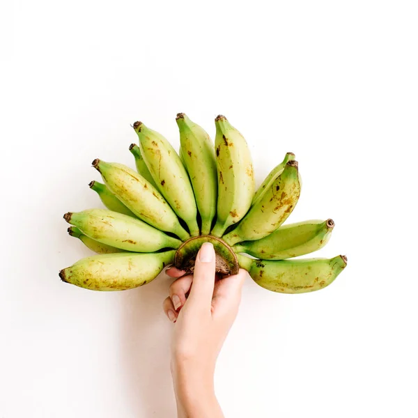 Hand holding bos van bananen — Stockfoto