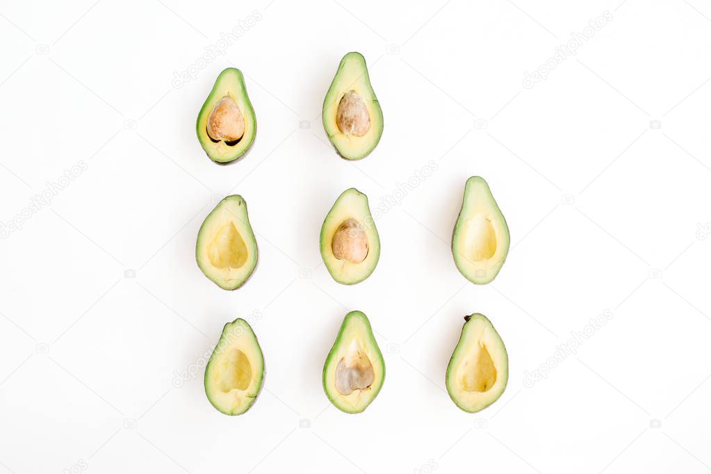 Sliced raw avocados arrangement.